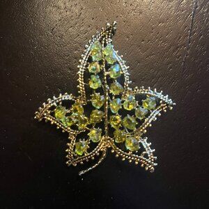 Vintage Gold Tone Open Work Leaf Design with Green Peridot Like Stones